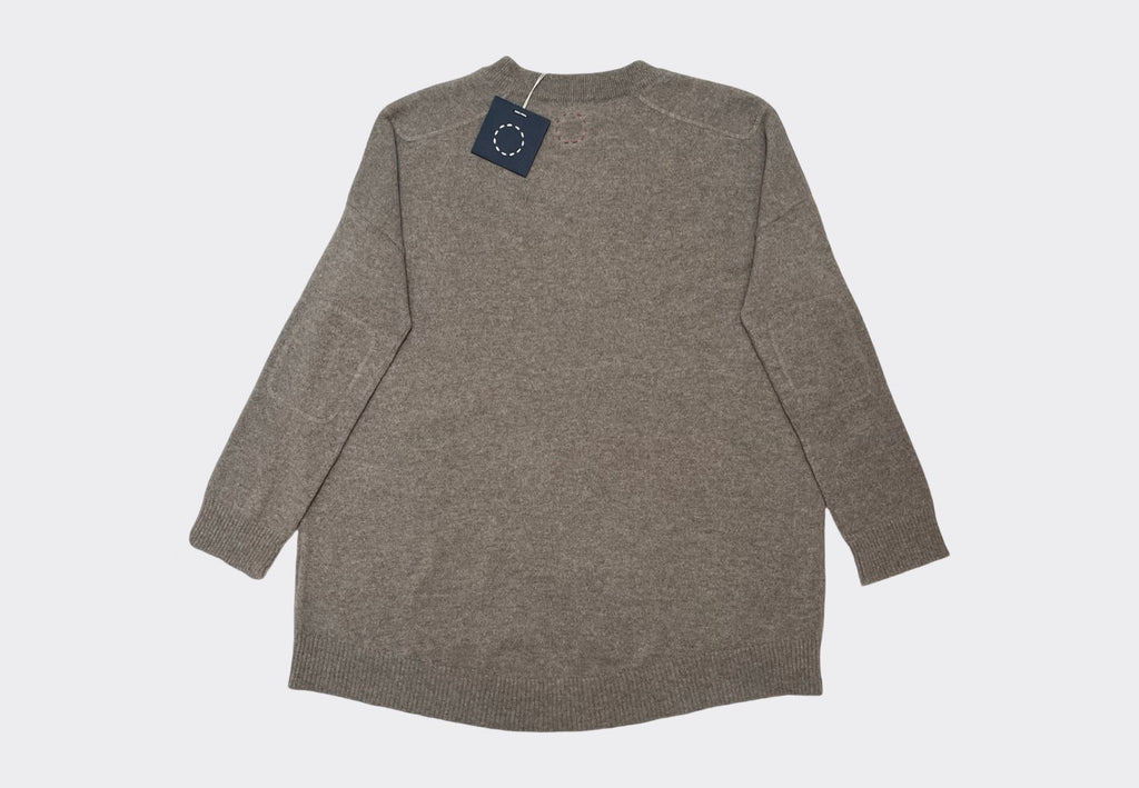 Front product image of Sphere One Box Set Cashmere Sweater in Desert Dune neutral colour with matching cashmere elbow and shoulder patches, and circle of stitches logo at back neck