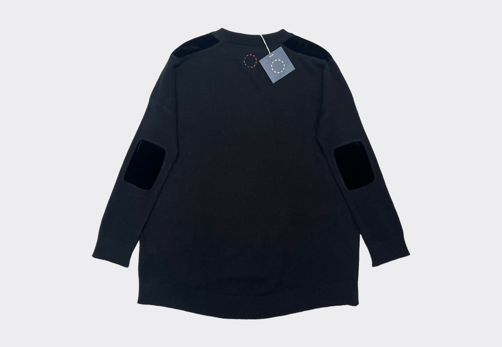 Back product flat lay black round neck cashmere sweater with black velvet shoulder and elbow patches, navy Sphere One swing tag visible