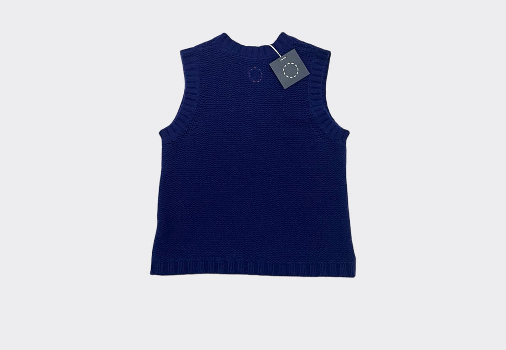 Back product image of deep blue knitted cashmere vest with Sphere One navy swing tag and pink yarn circle of stitches logo visible